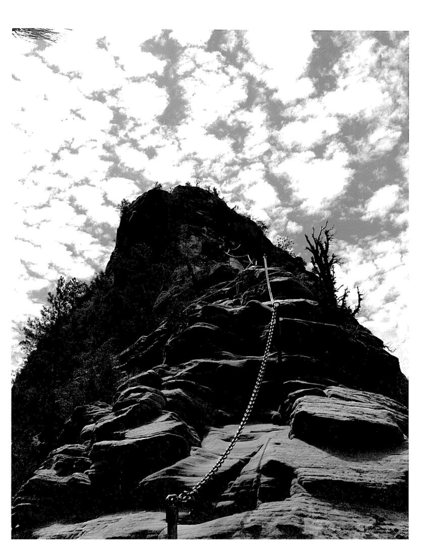 A black and white photo of a rock formation.