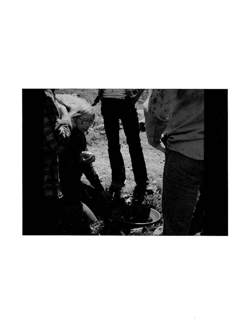 A black and white photo of some people standing