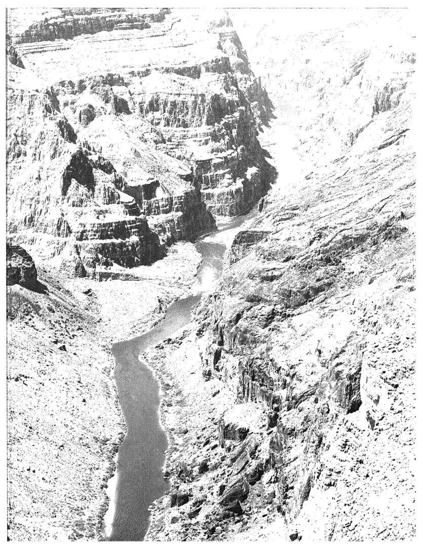 A black and white image of a rock face.